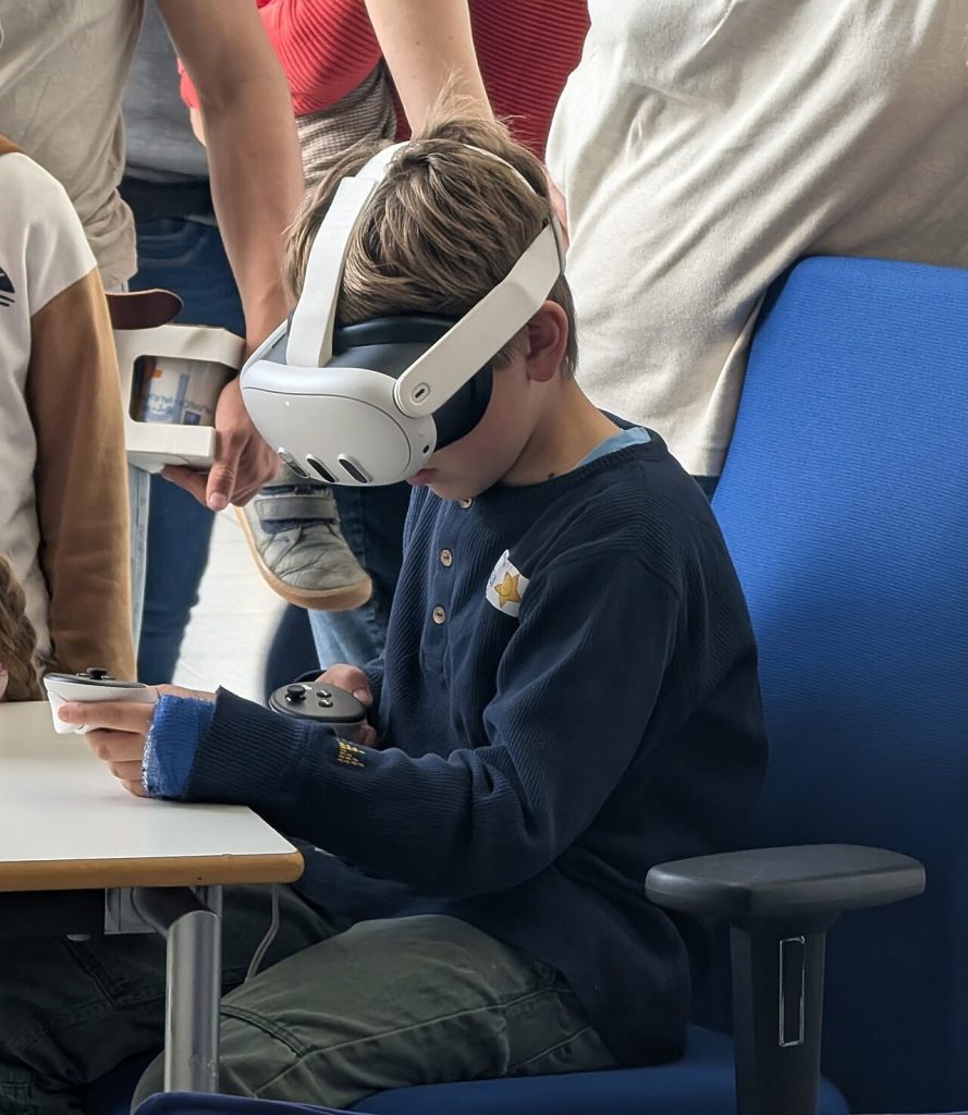 Woman playing a video game while wearing a virtual reality headset