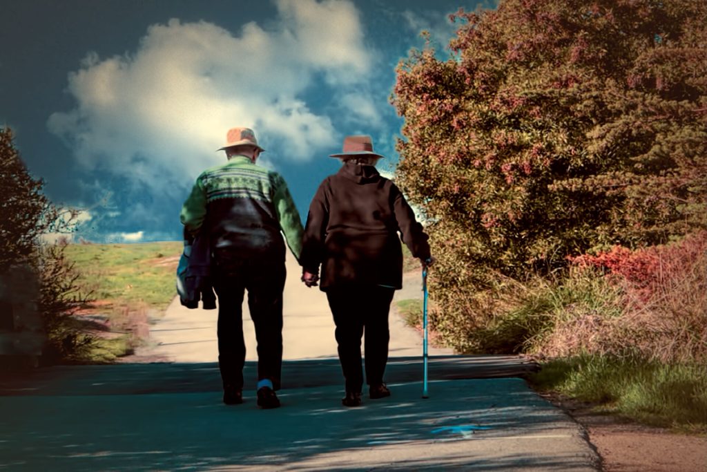 Retirement’s New Risk Is Living Too Long, Financially Speaking Couple walking (16267925833)
